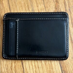 COACH Black Leather with White Stitching credit card holder.